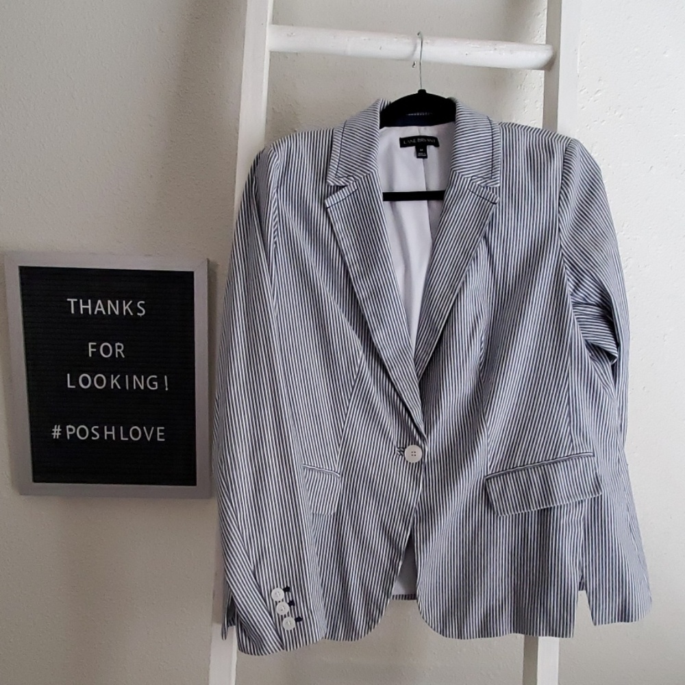 Pinstripe Blazer. Tailored front vents.